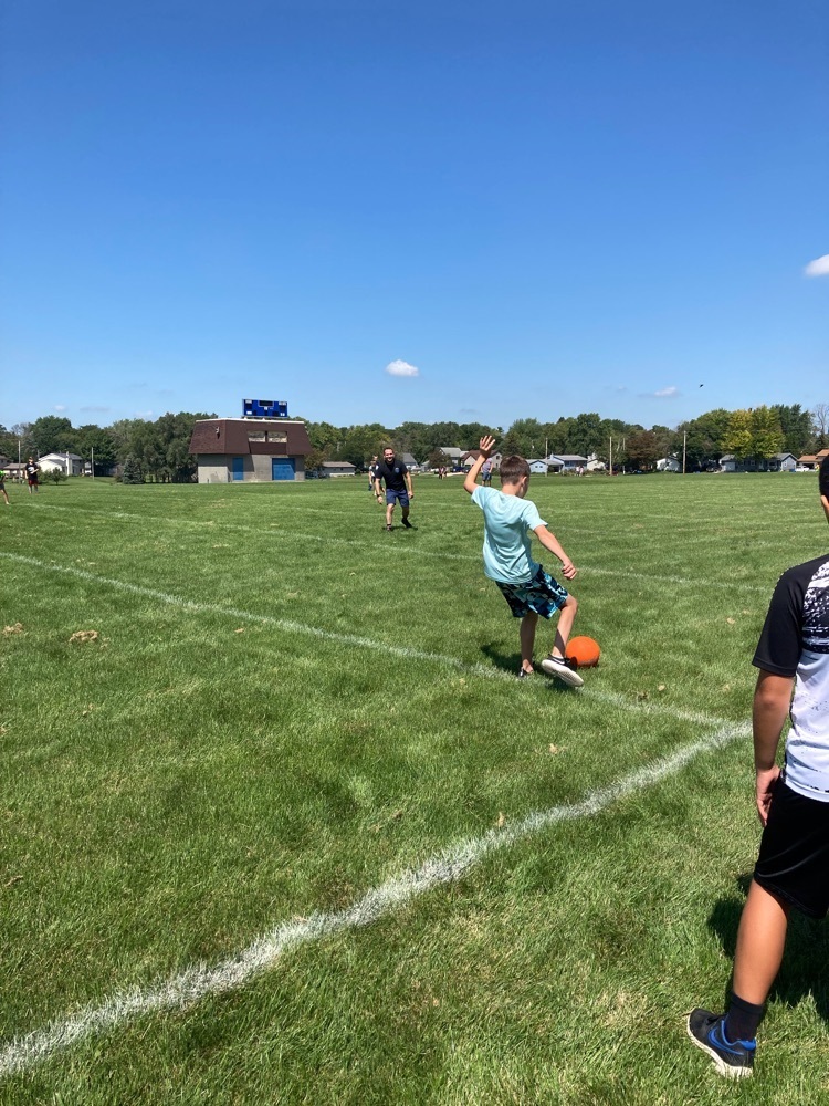 boy playing kicker