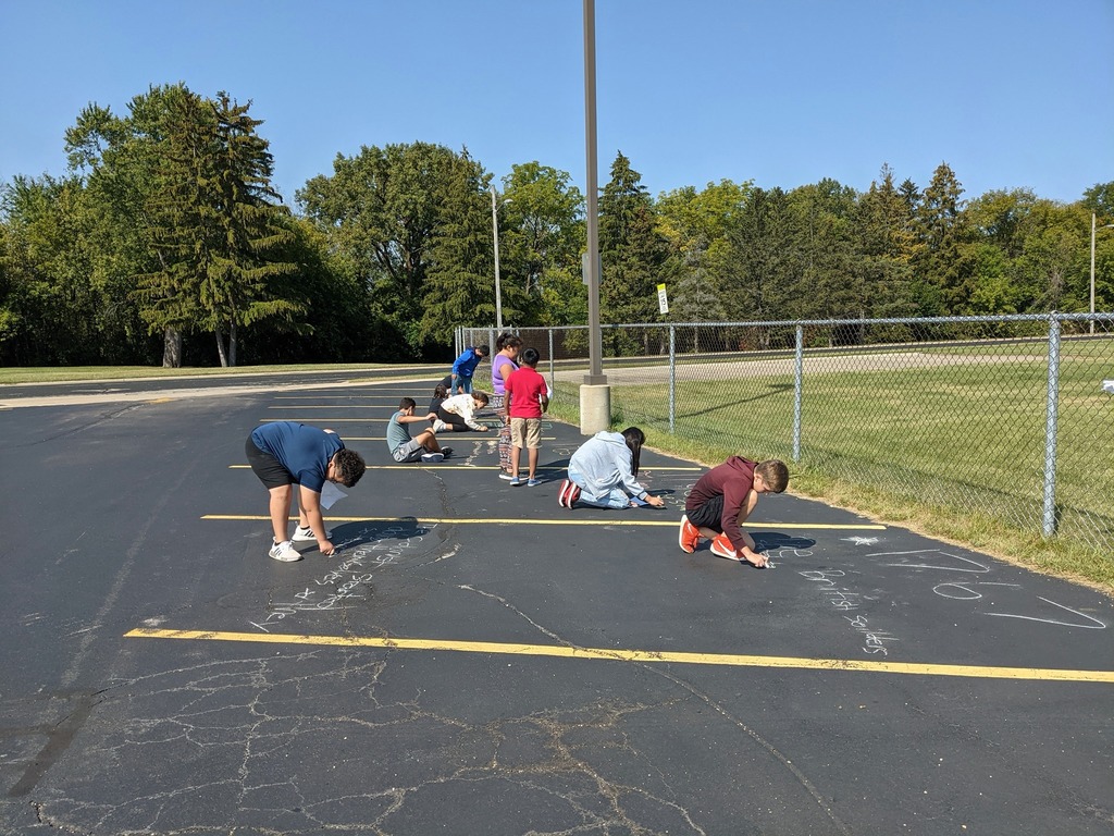 Students working on chalk project
