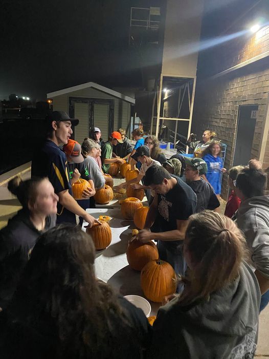 Students Carving Pumpkins