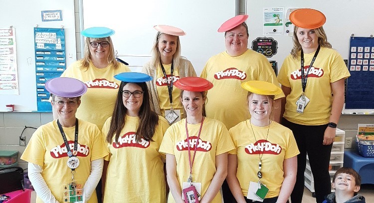 Teachers dressed up as Play-Doh containers