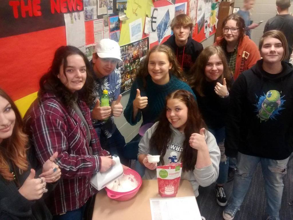 Students Giving a Thumbs Up