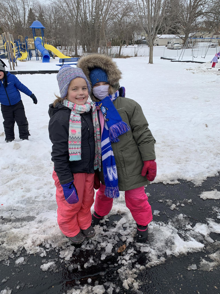 Two girls outside in snowgear