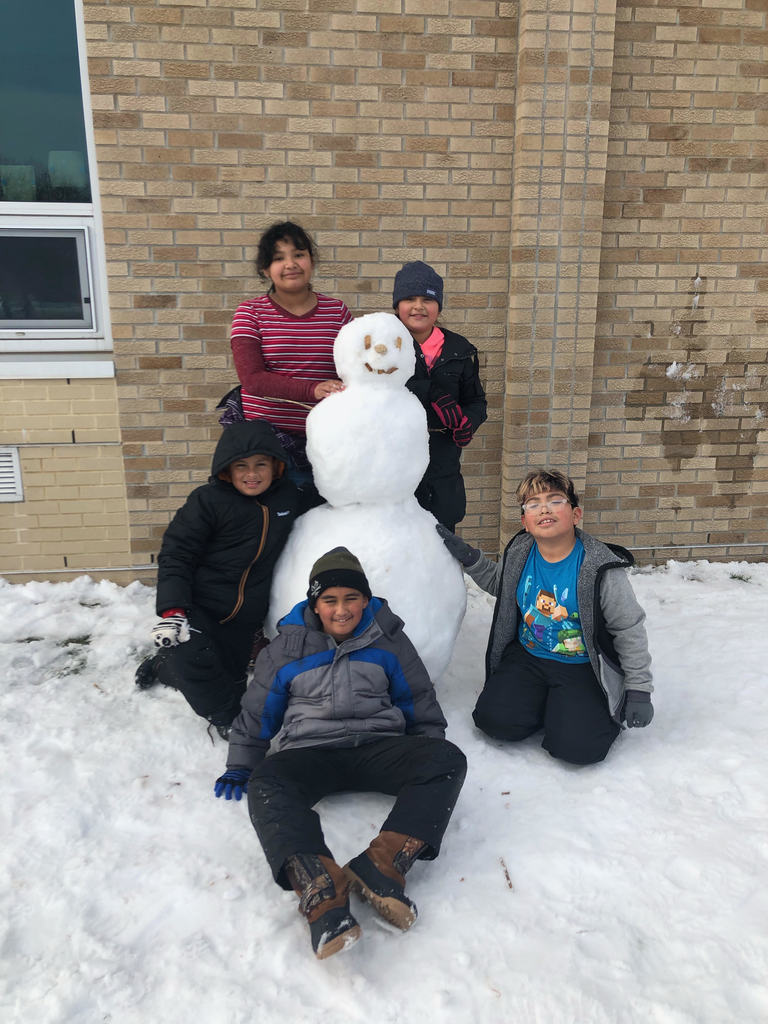Five students with a snowman