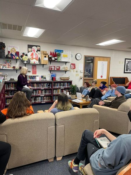 Former teacher talking to students