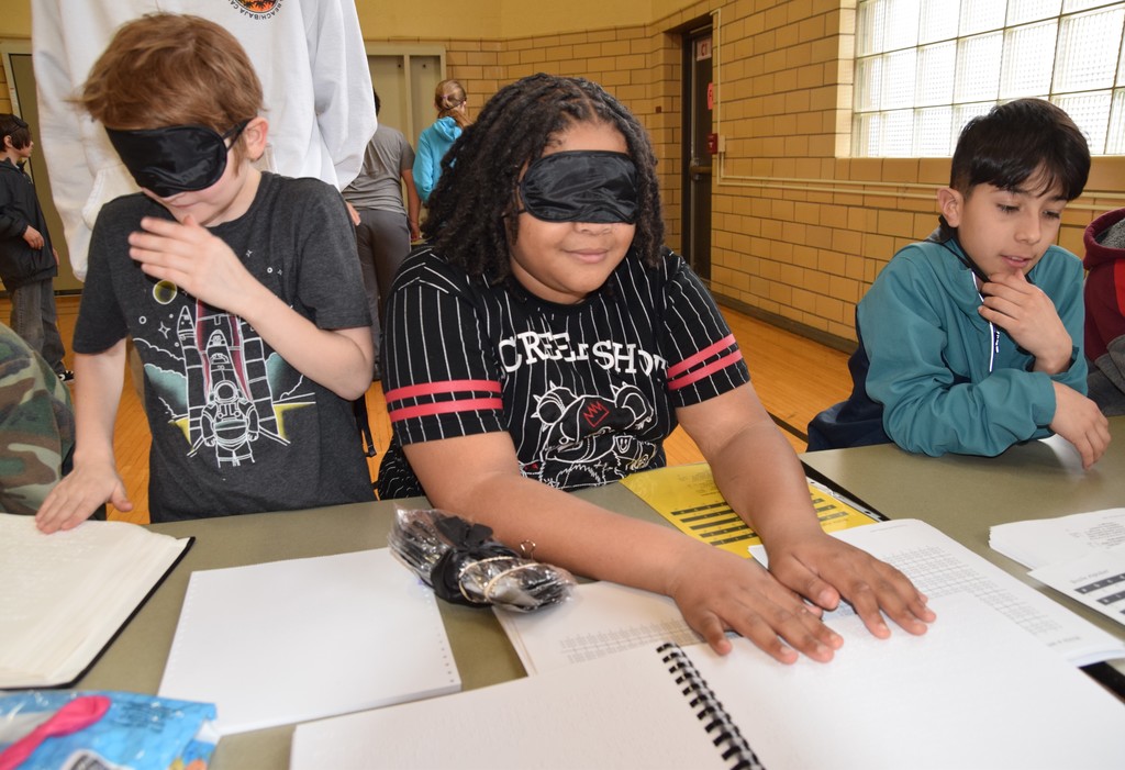 Students wearing blindfolds