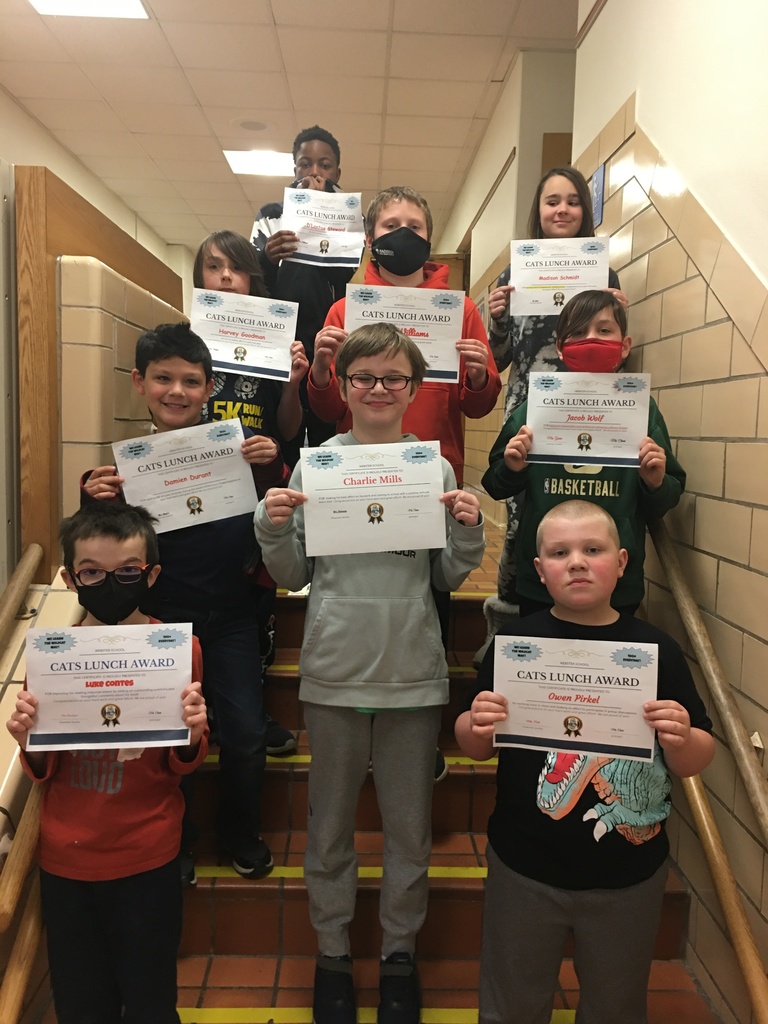 Students with award certificates