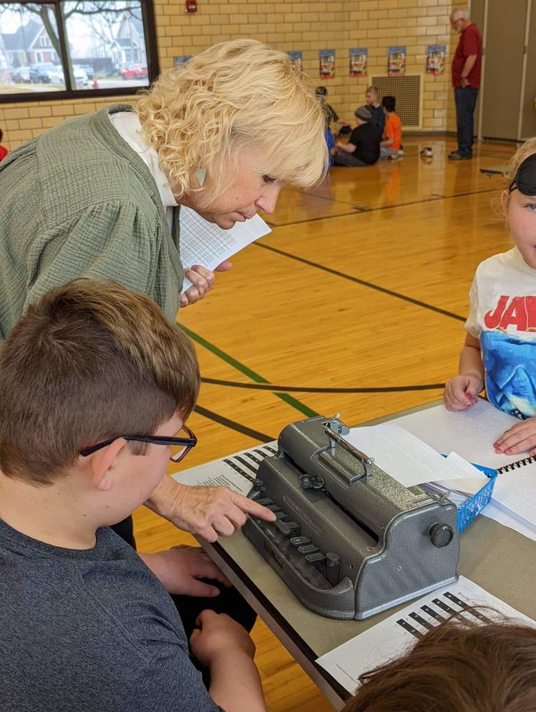 students learning braille