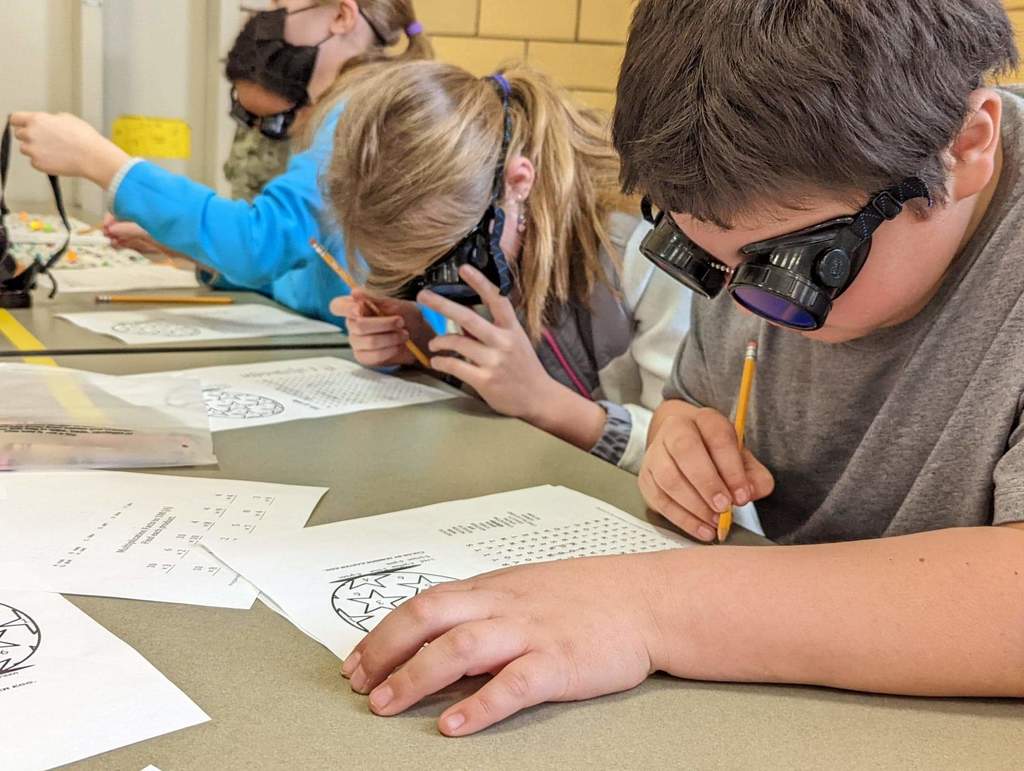 students learning braille