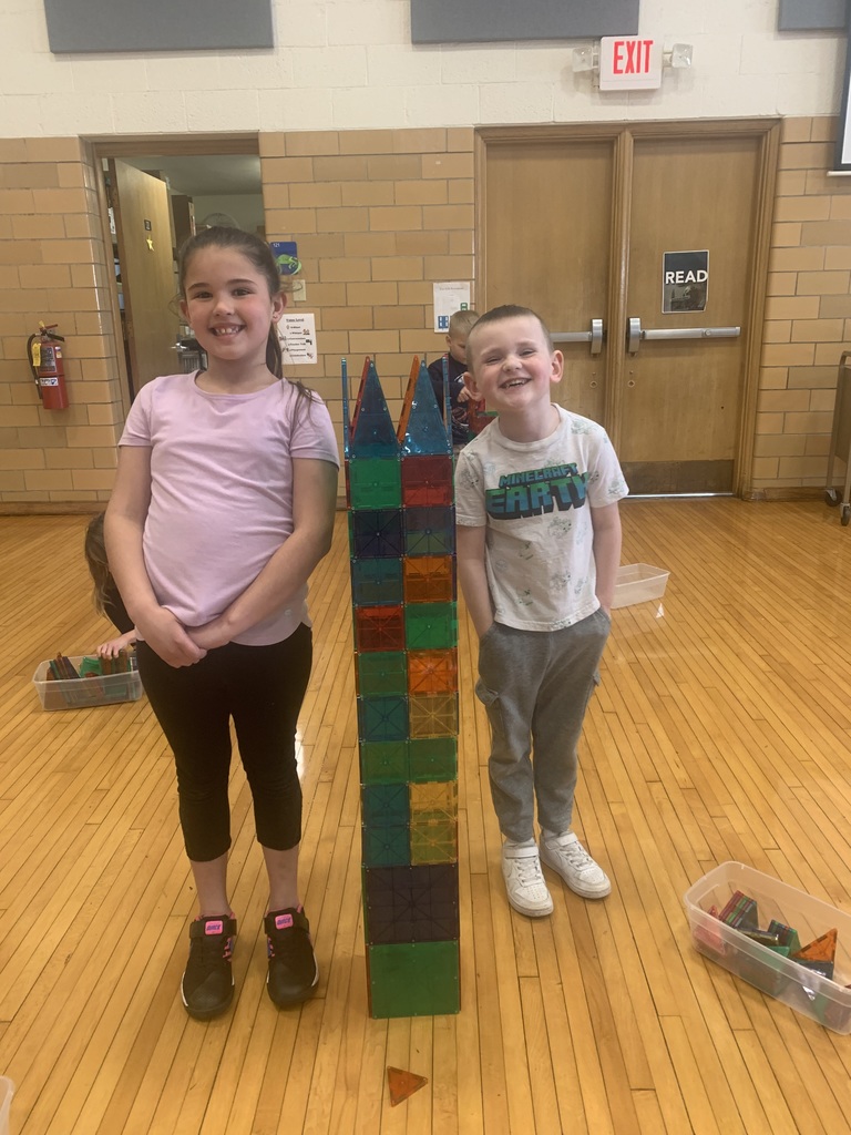 Students building a tower
