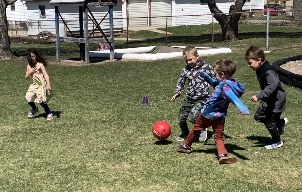 Kids playing soccer