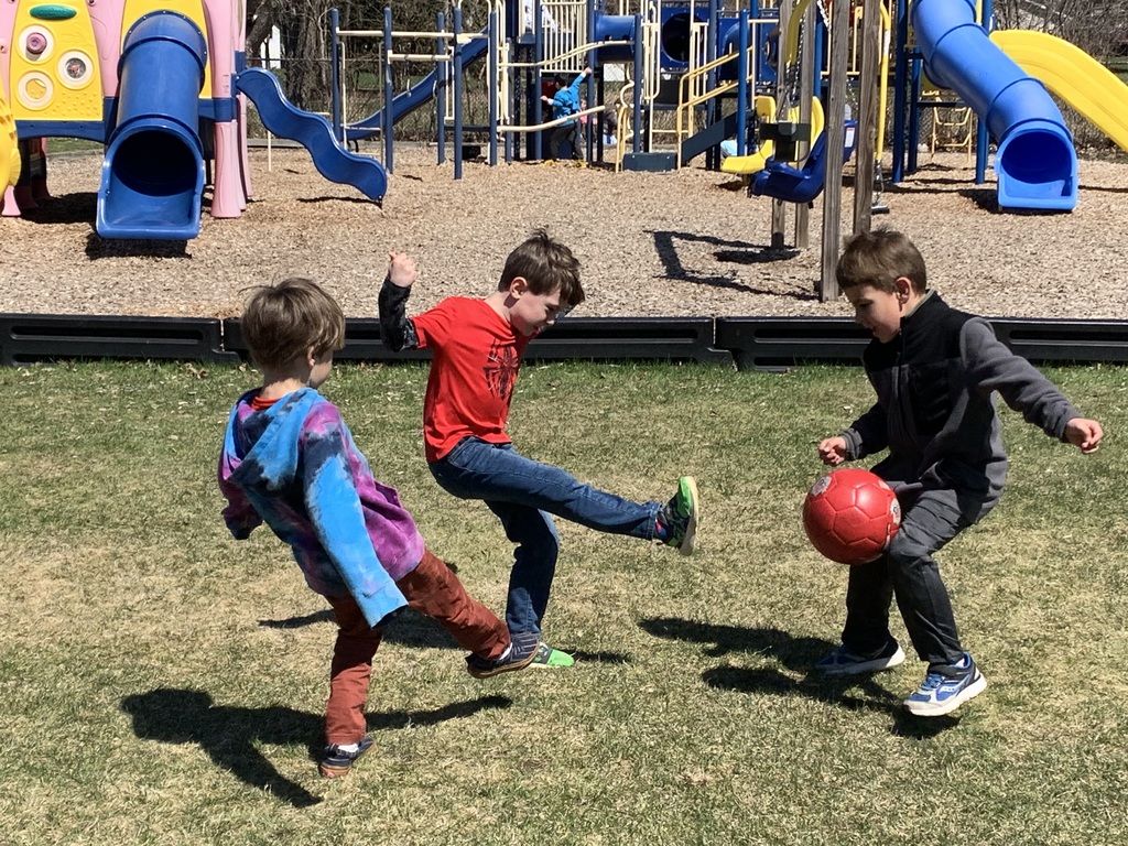 Kids playing soccer