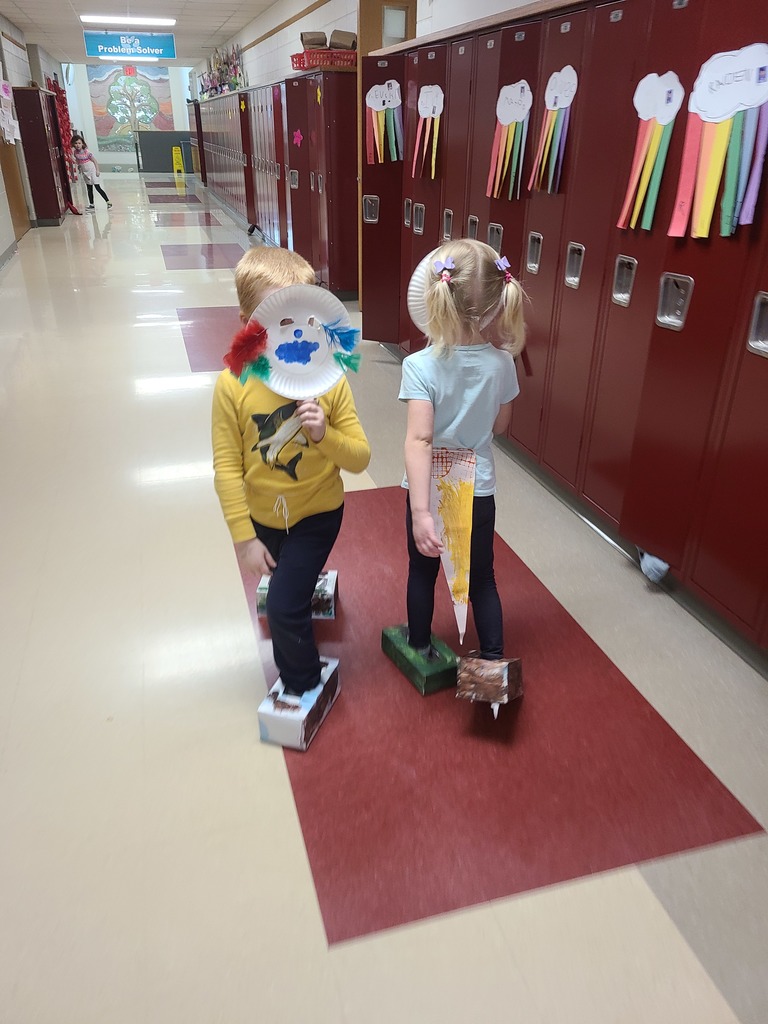 Students in a dinosaur parade