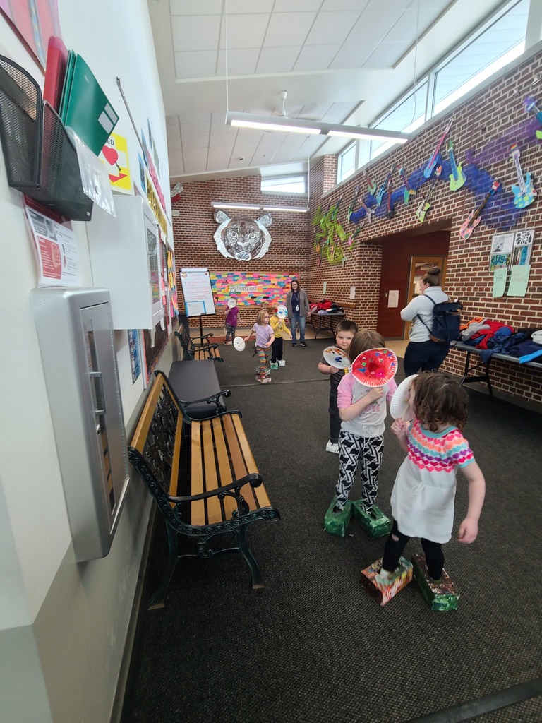 Students in a dinosaur parade