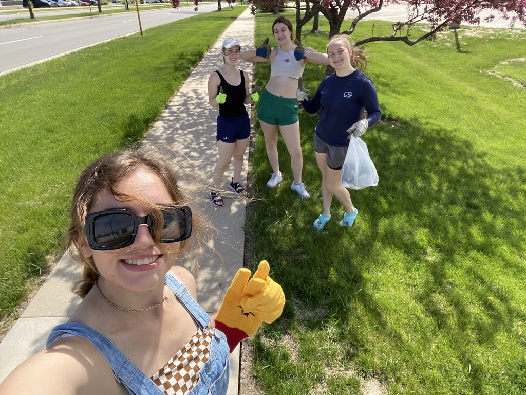 Students cleaning up litter