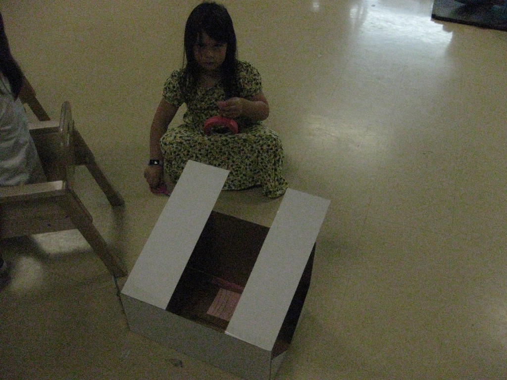 Students creating things out of cardboard