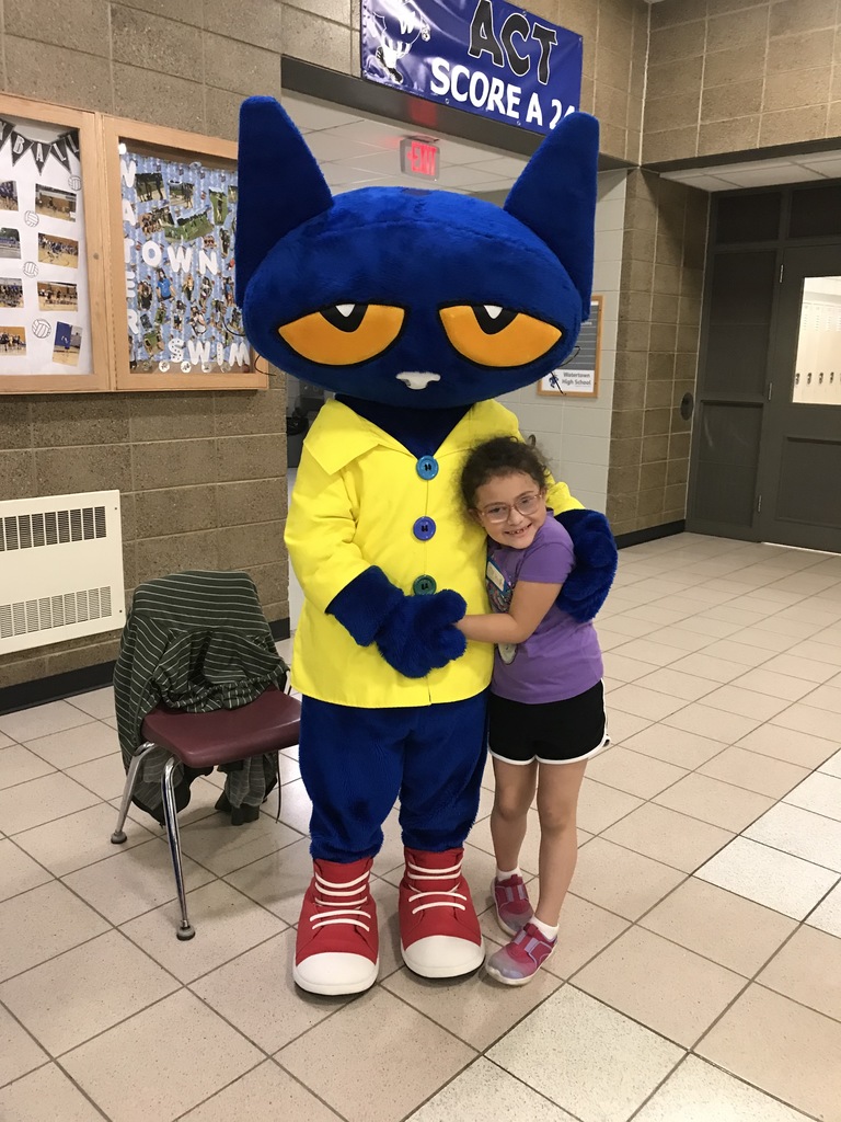 Pete the Cat with a student