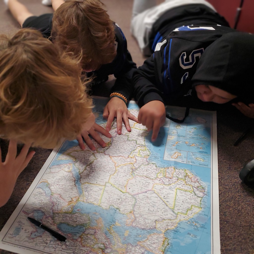Two students looking at a map