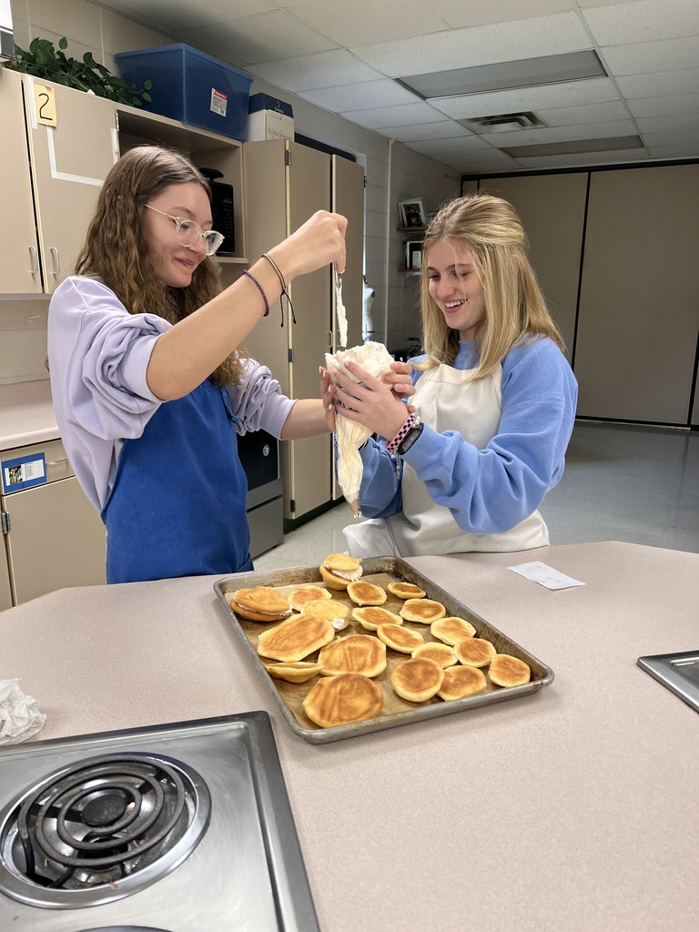 students making cream for cream puffs