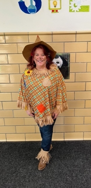 Staff member dressed as a scarecrow