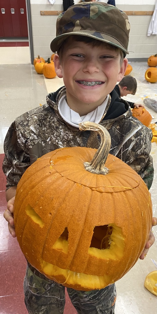 Student with pumpkin