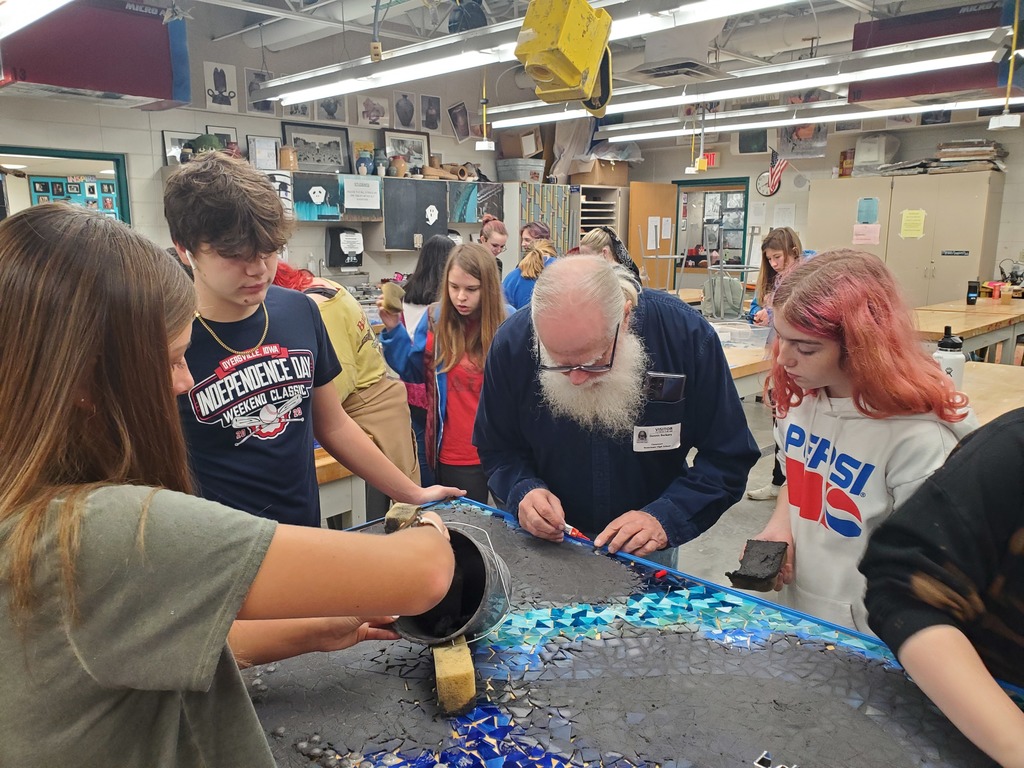 Students making a mural