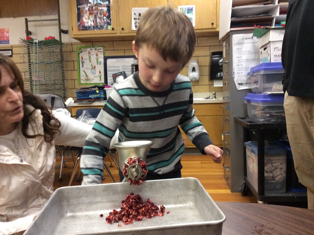 Student making cranberry relish