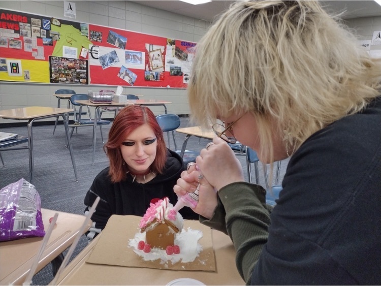 students making a gingerbread house