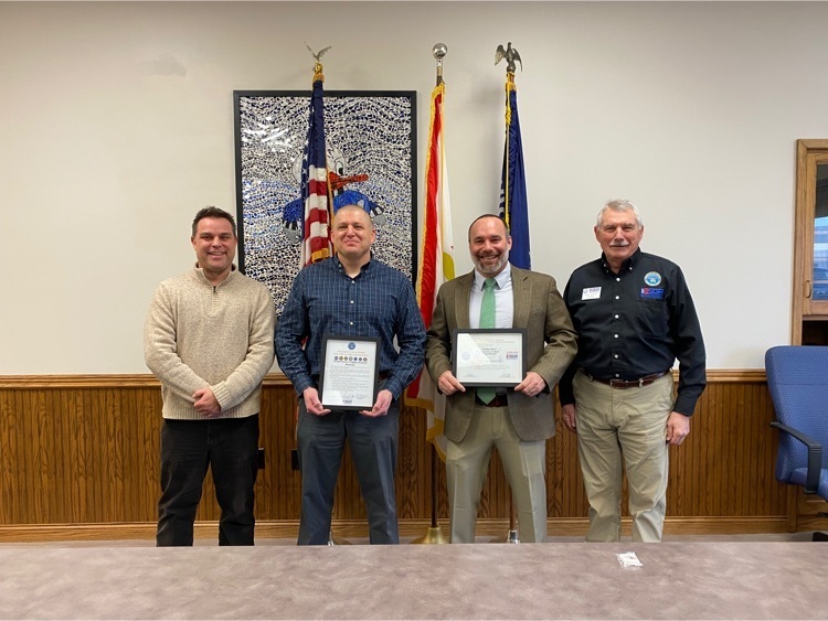 four men service award recognition
