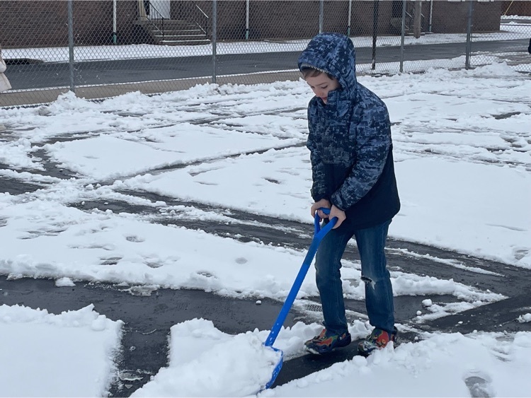 student shoveling